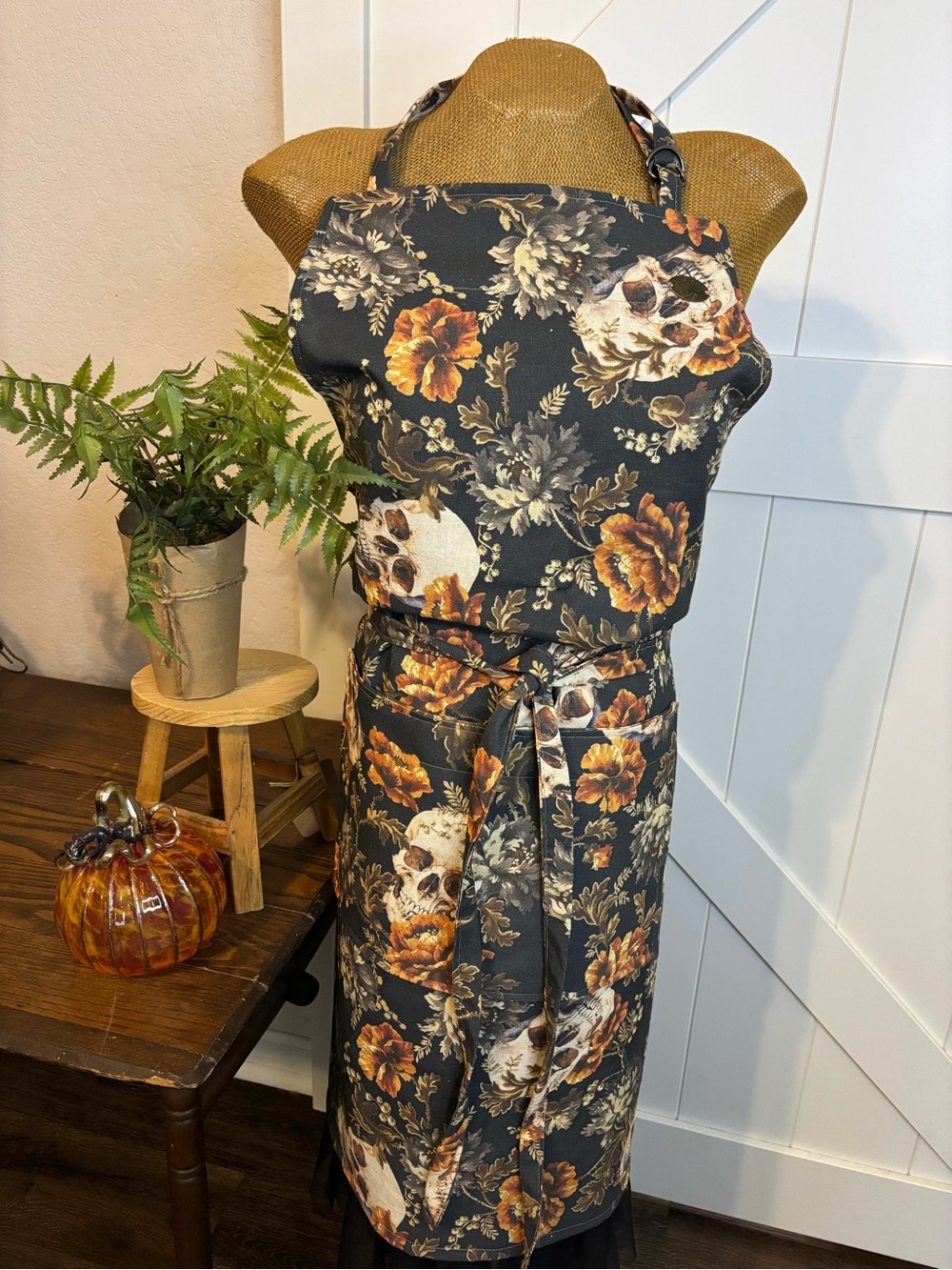 Dark Floral Skull Apron with Orange Accents